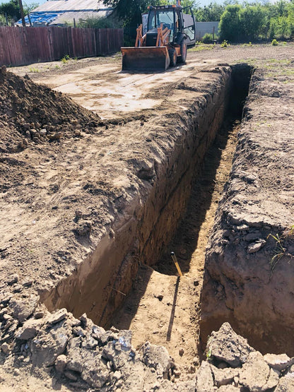 Backhoe loader rental with operator in Waterford, Ca.