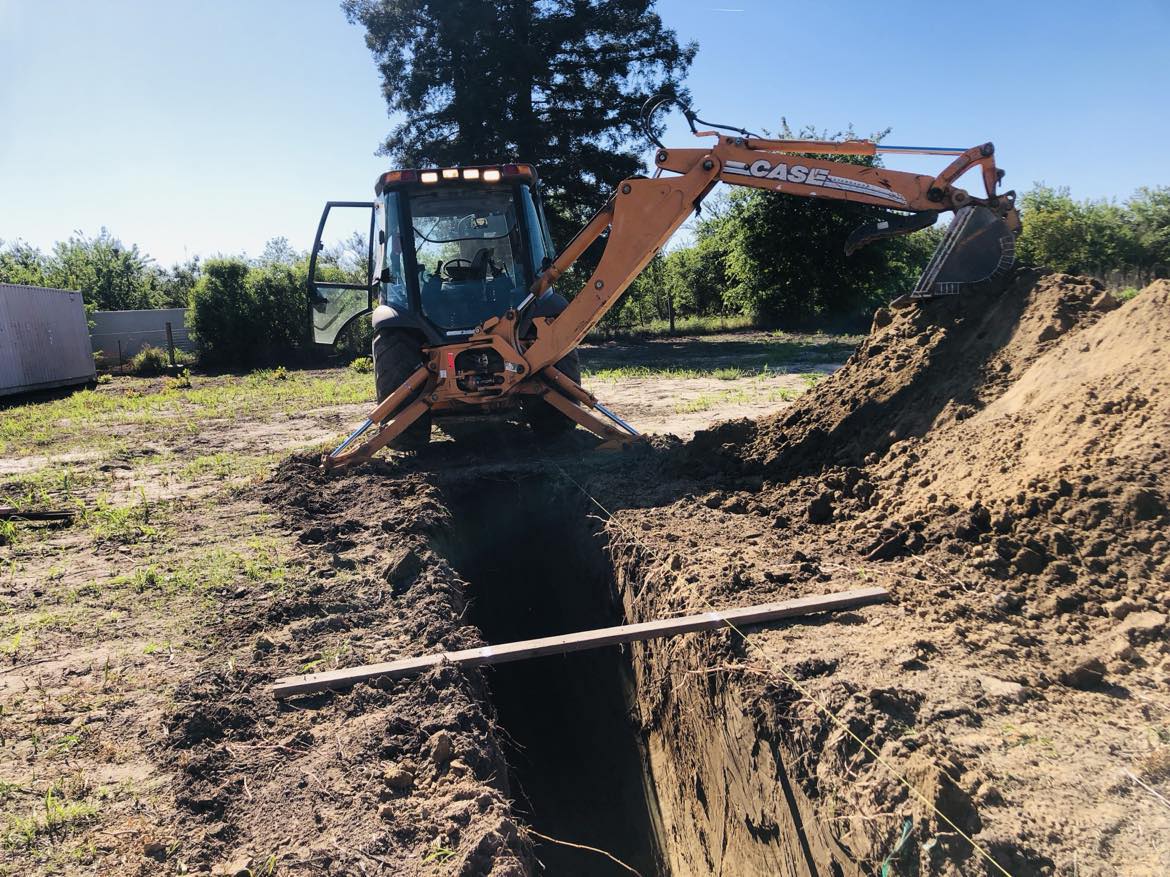 Backhoe loader rental with operator in Waterford, Ca.
